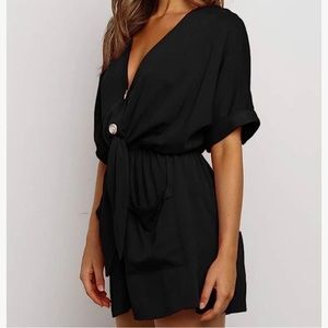 Medium.  V Neck Button Romper
